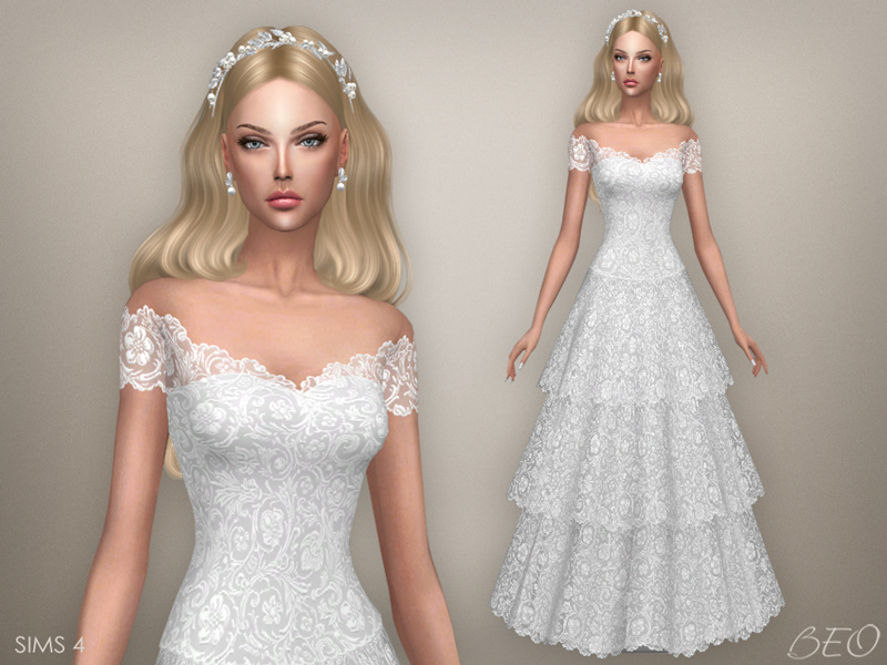 A layered lace skirt with a slight v neck over a sweetheart corset 