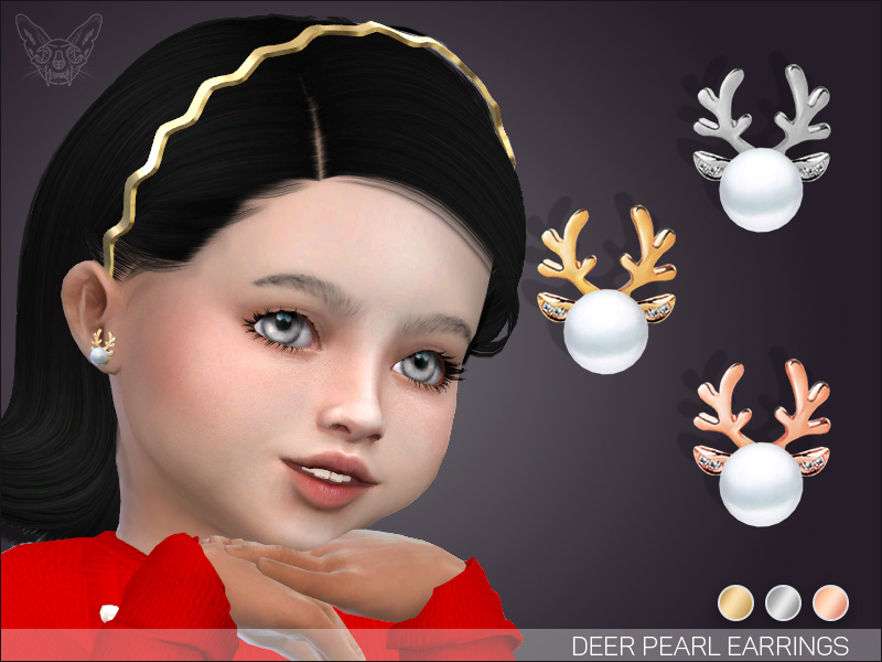 A sim with black hair and light green eyes, holding her hands under her chin. She's wearing a pair of sims 4 cc Christmas accessories earrings that look like a reindeer with a pearl as the head 