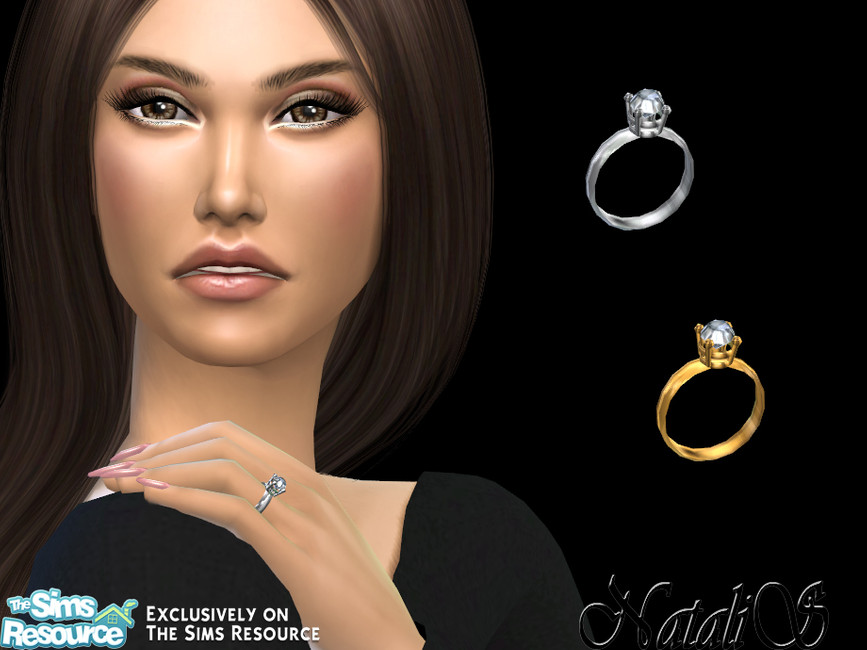 A sim with brown hair, brown eyes, and pink nails. They are wearing a very simple diamond sims 4 cc engagement ring. 