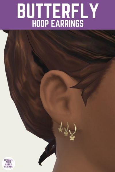 This is a product image for a pair of custom content earrings for the sims. At the top is a purple bar with white text that says "butterfly hoop earrings" and below is an ear, close up. There are three small butterflies off small hoop earrings. 