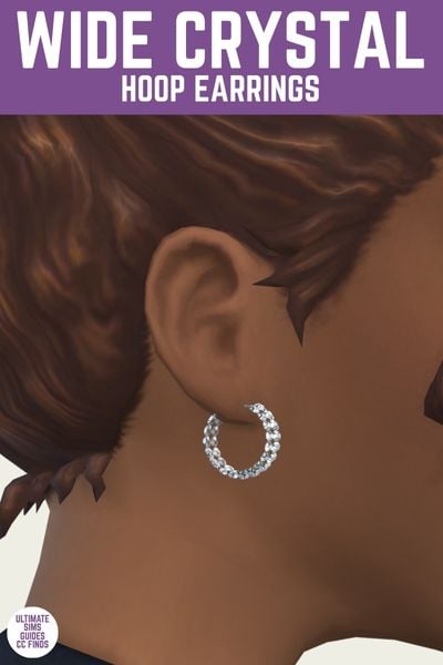 This is a product image for a pair of custom content earrings for the sims. At the top is a purple bar with white text that says "wide crystal hoop earrings" in text and below that is a close up of a sim's ear with diamonds 