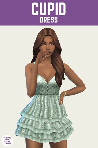 This is a product image for a dress by Trillyke. The image has a purple bar at the top with white text that says "Cupid Dress" and below is a sim wearing a spaghetti strap dress in light teal and the dress has a flower pattern 