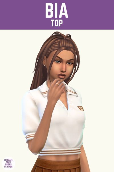 This image has a purple bar at the top with white text that says "Bia Top" and below is a sim wearing a polo shirt with a logo on the chest and stripes on the edges 