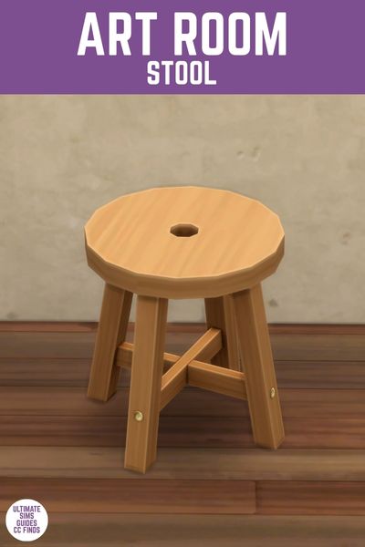 This image has a purple bar at the top with white text that says "Art Room Stool" and below is a stucco wall, dark wood floors and a circle stool 