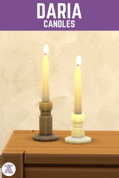 This image has a purple bar at the top with white text that reads "Daria Candles" and below is a close up of two candles that are lit 