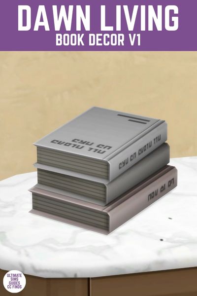 This image has a purple bar at the top with white text that reads "Dawn Living Book Decor V1" and below is a close up of three stacked books on an angle 