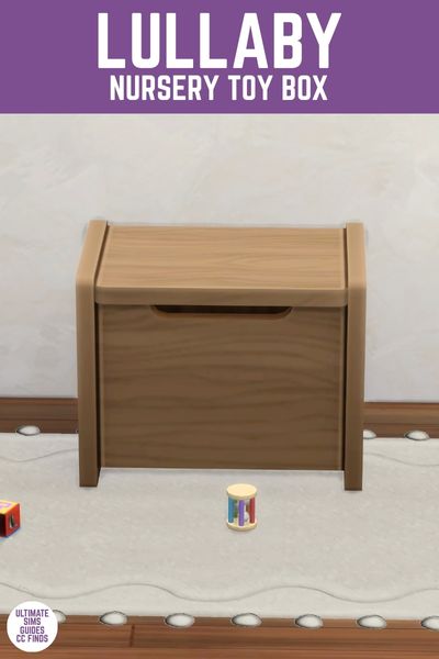 This image has a purple bar at the top with white text that says "Lullaby Nursery Toy Box" and below is an image of a wooden toy box on a rug with a few toys on the ground 