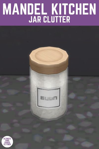 This image has a purple bar at the top with white text that reads "Mandel Kitchen Jar Clutter" and below is a close up of a round jar with wooden lid 