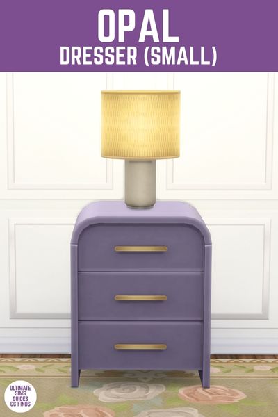 This image has a purple bar at the top and white text that says "Opal Dresser (Small)" and below is an image of a small three-drawer side table with a lamp on top 
