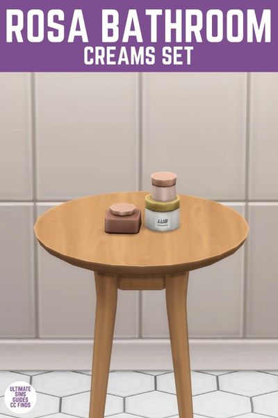 This image has a purple bar at the top with white text that says "Rosa Bathroom Creams Set" on it and below is a circle table with three jars of creams on top in pink, white and gold. 