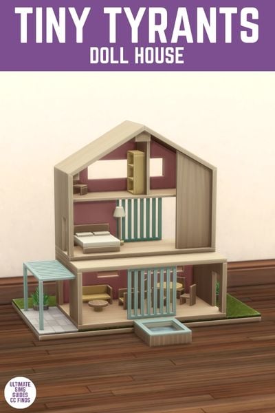 This image has a purple bar at the top with white text that reads "Tiny Tyrants Doll House" and below is a wooden floor and plain wall with a wood and blue dollhouse.