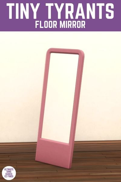 This image has a purple bar at the top with white text that reads "Tiny Tyrants Floor Mirror" and below is. a bright pink mirror on an angle. 