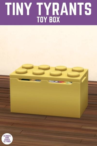 This image has a purple bar at the top with white text that reads "Tiny Tyrants Toy Box" and below is a yellow Lego themed toy box 